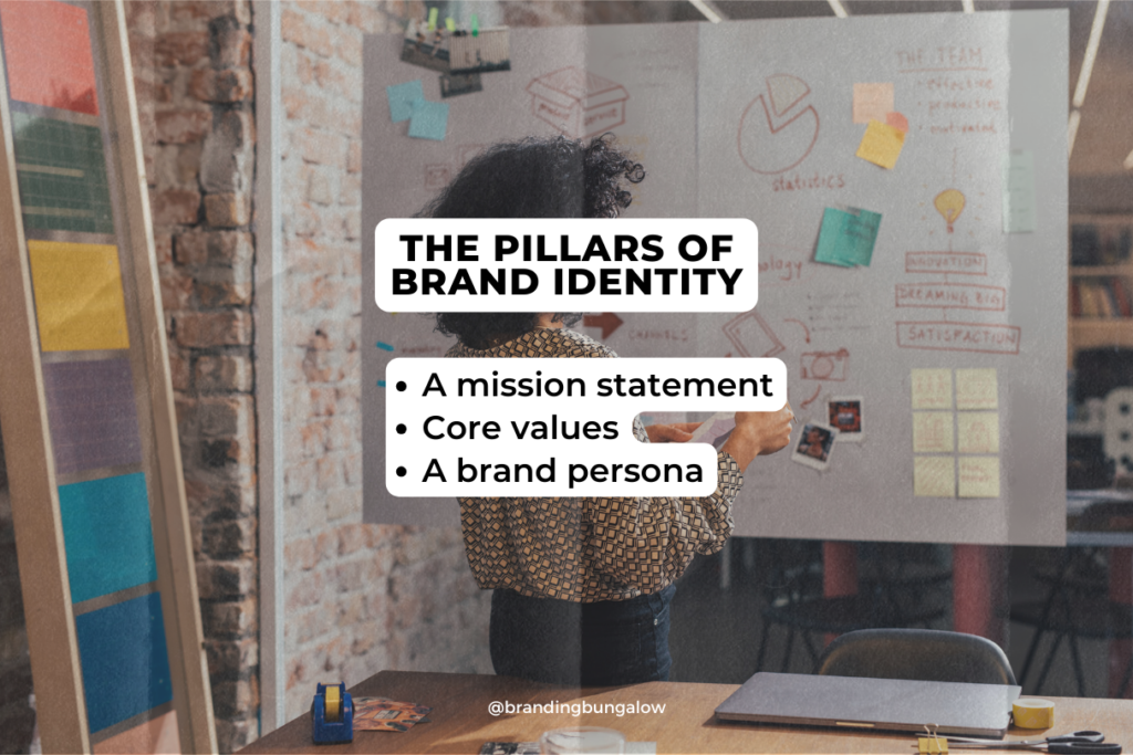 A woman uses a board to craft a successful brand identity.