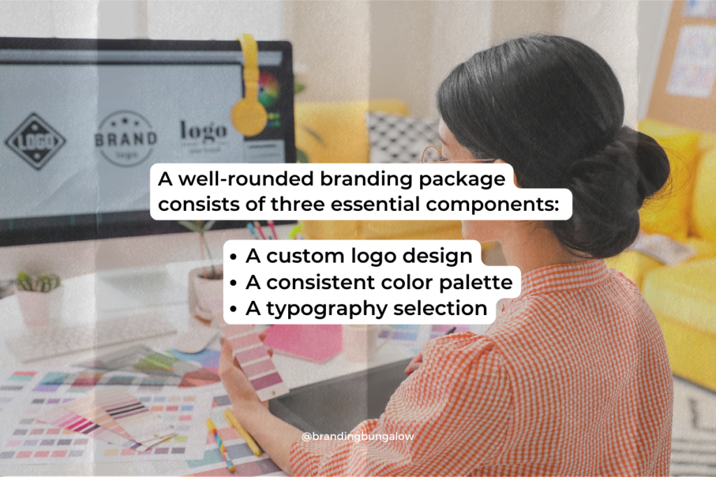 A woman designs the essential components of a brand design package.