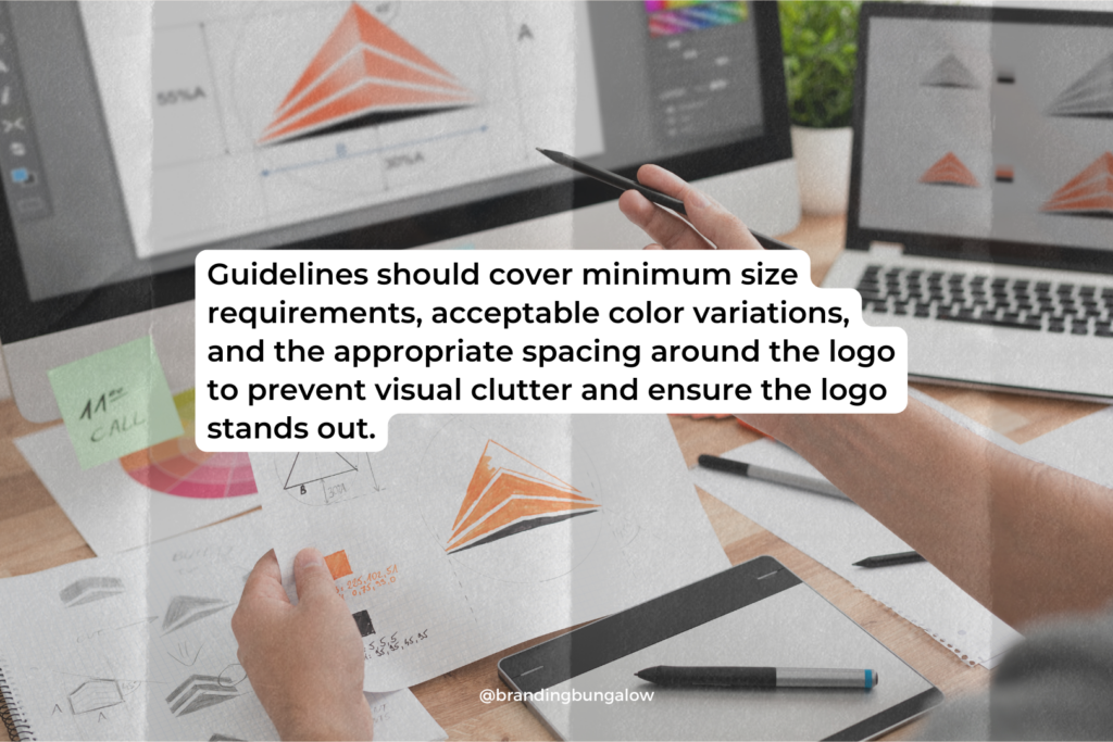 A logo designer designating logo guideline measurements.