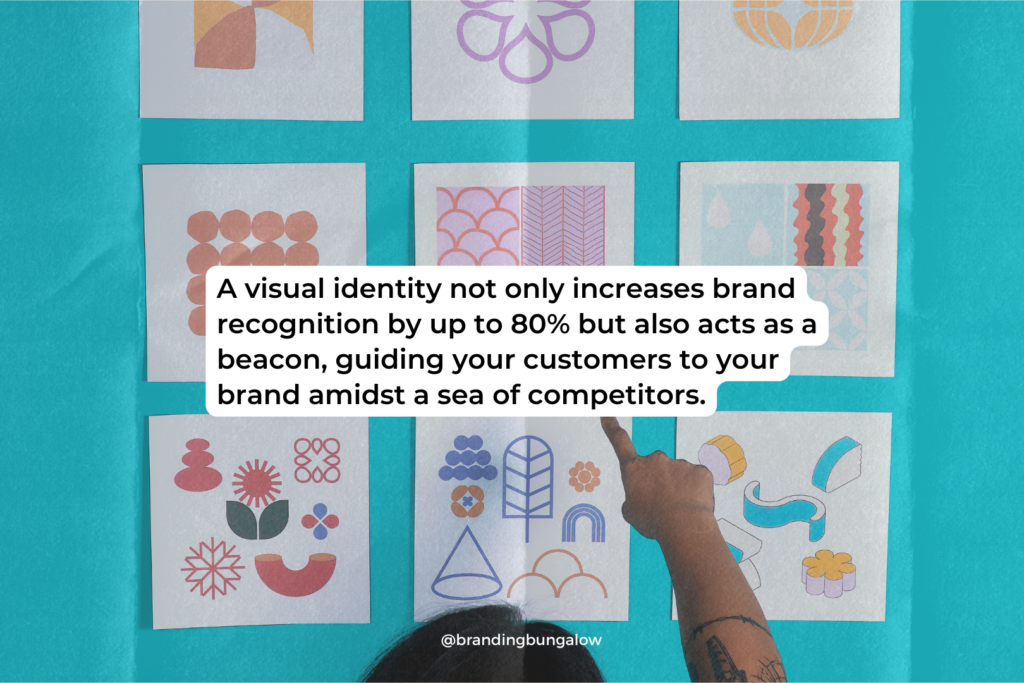 A woman chooses between options for her brand's visual identity.