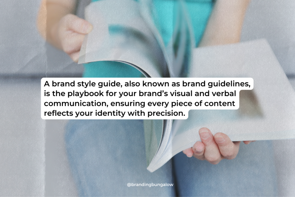 A woman flips through a brand style guide.