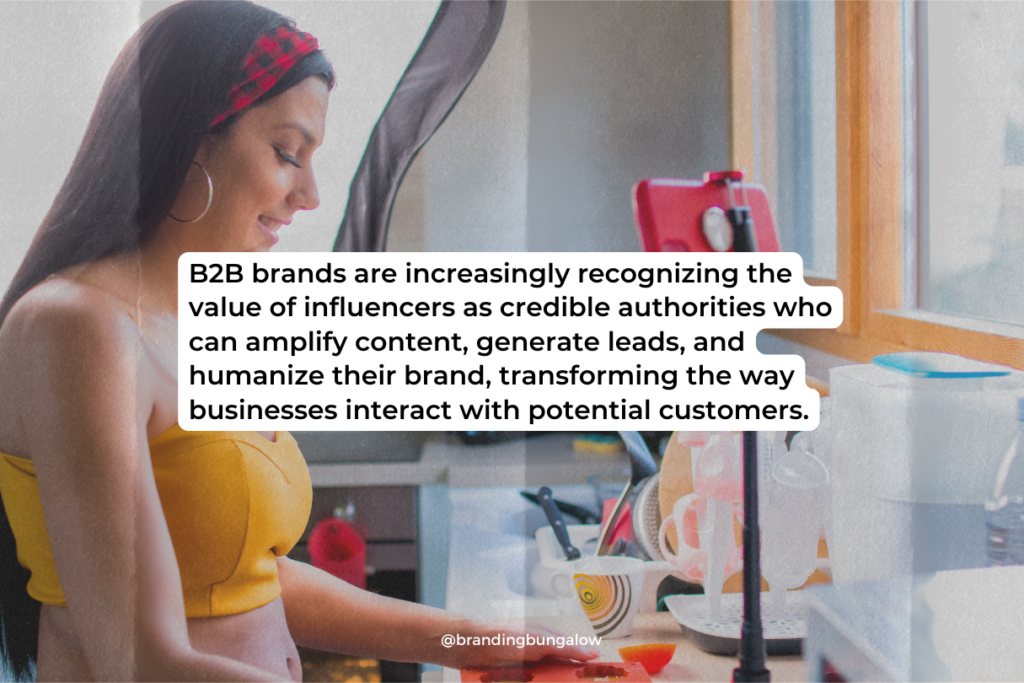 An influencer creates live content in her kitchen for a B2B marketing brand.